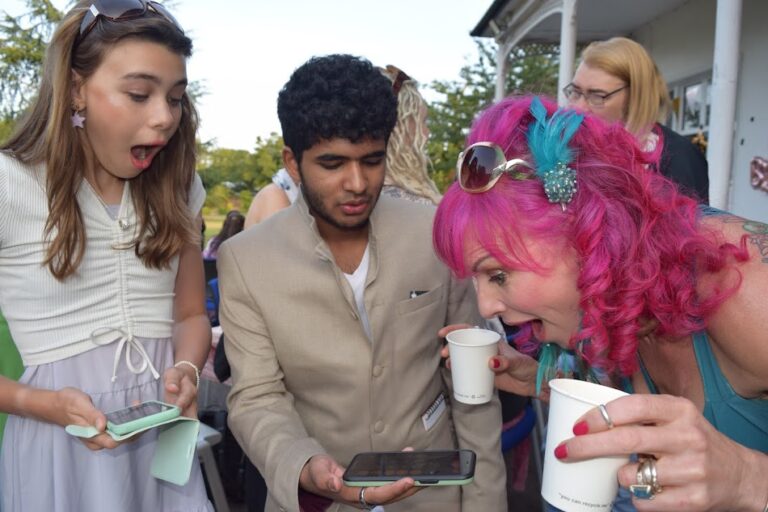 "Coventry magician Dvishan performing close-up magic at an event"