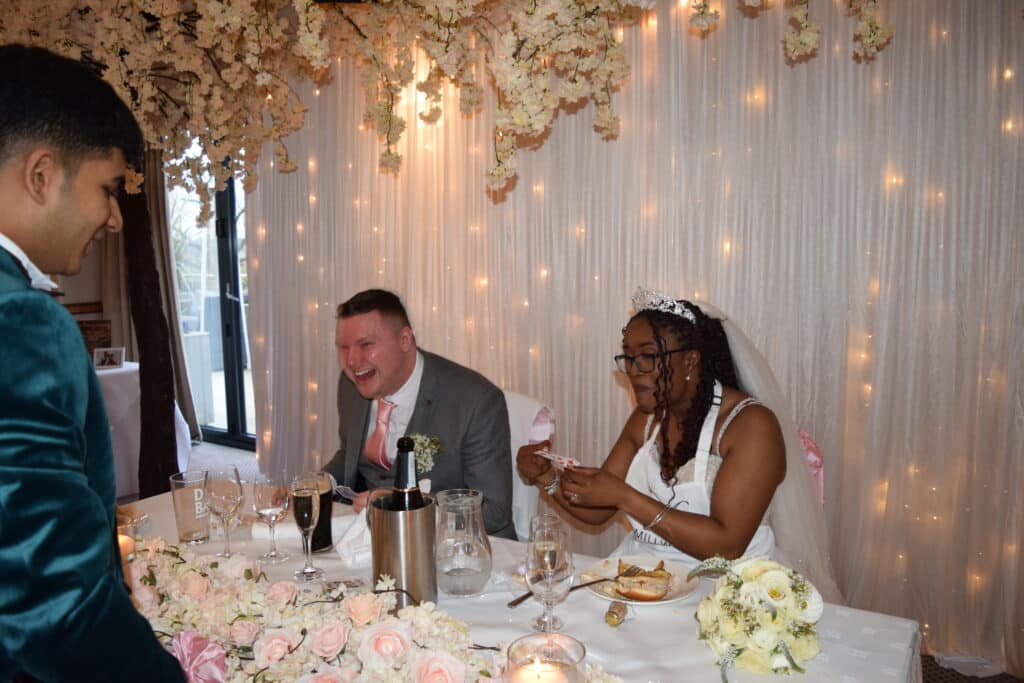 Beford magician performing close-up magic for a live audienc