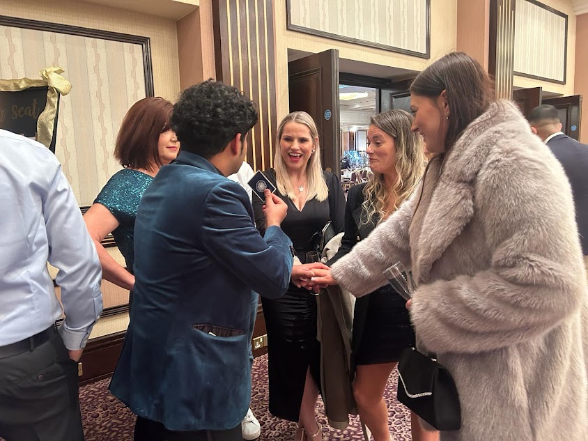 Dvishan (Magician Wolverhampton astounding guests with card magic.