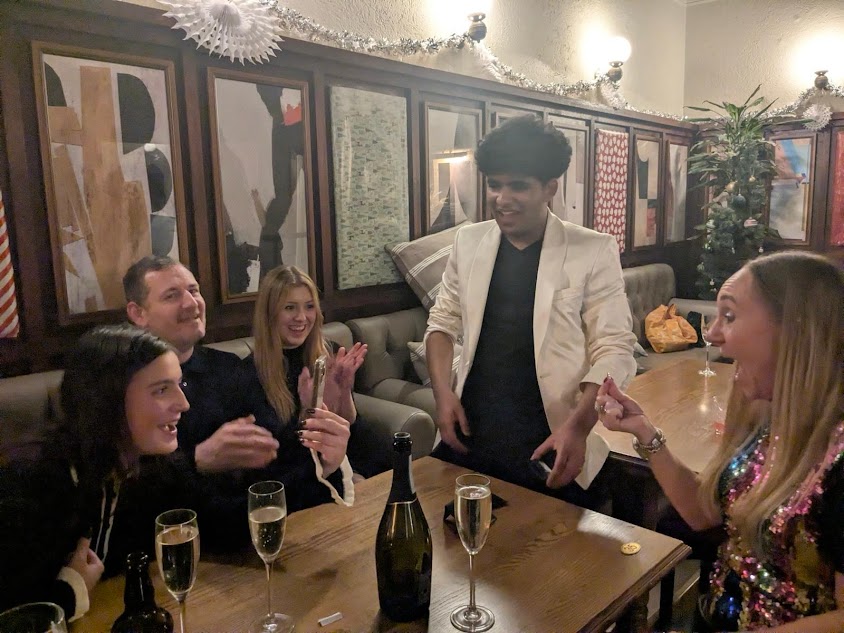 Magician in Birmingham performing close up magic at a wedding